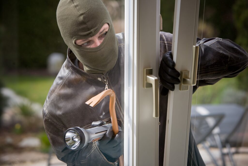 Burglar breaks into home with crowbar.