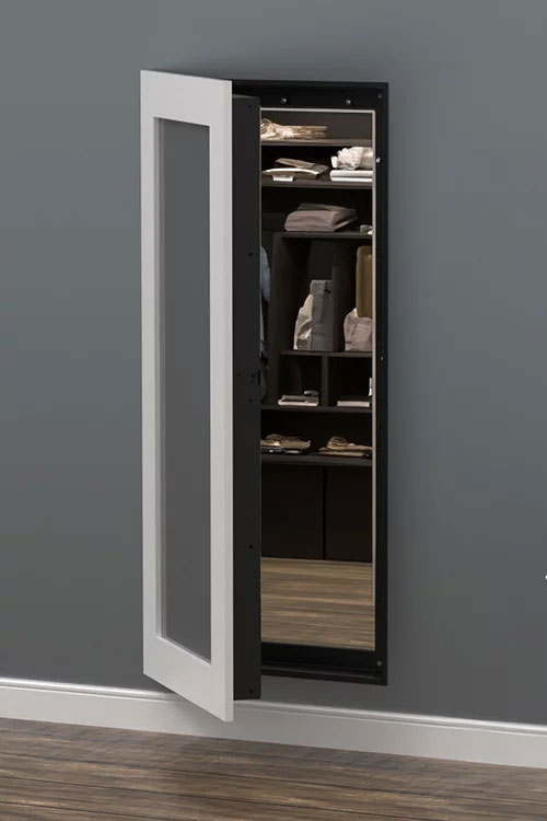 White frame vault mirror door opening to closet